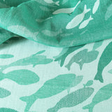 Swirling Fishes Emerald Half linen Blanket by Didymos